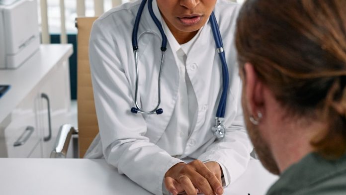 Doctor and male patient — health screening