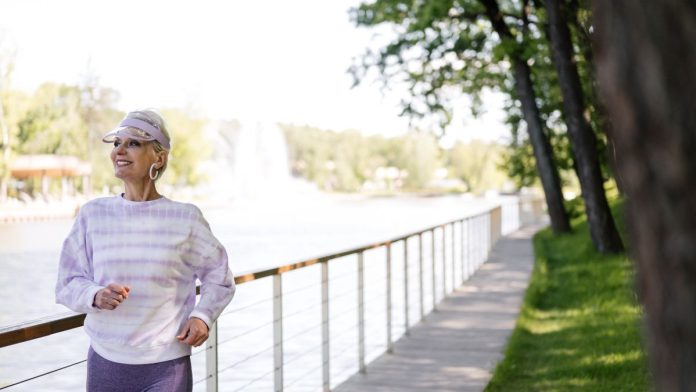 Woman walking outdoors for fitness