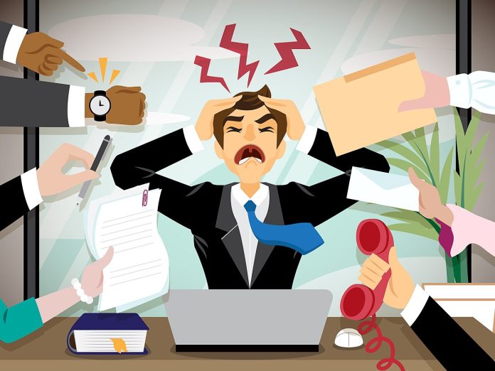 stressed man office work