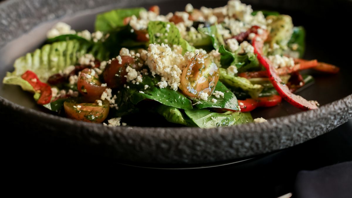 A fresh salad of quinoa and vegetables, typical of Mediterranean diet meals