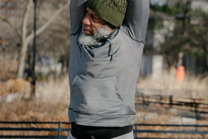 Man stretching and warming up outdoors before exercise