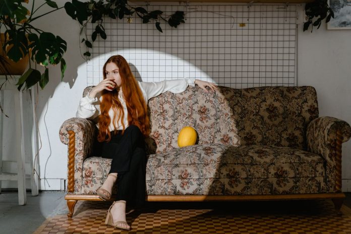 Woman eating fresh fruit as part of an antioxidant-rich diet