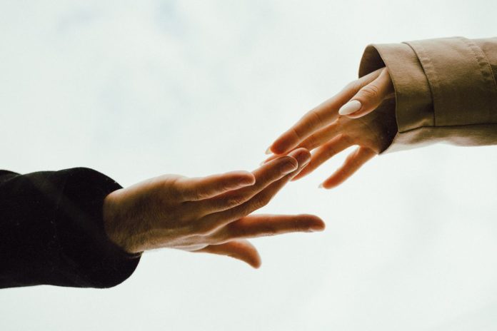 Couple holding hands