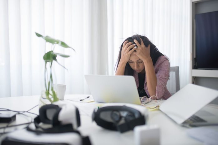 Stressed woman at work