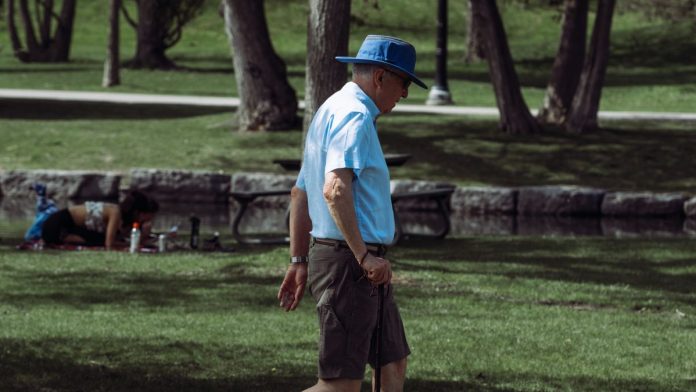 Older man walking outdoors to stay active and lower type 2 diabetes risk