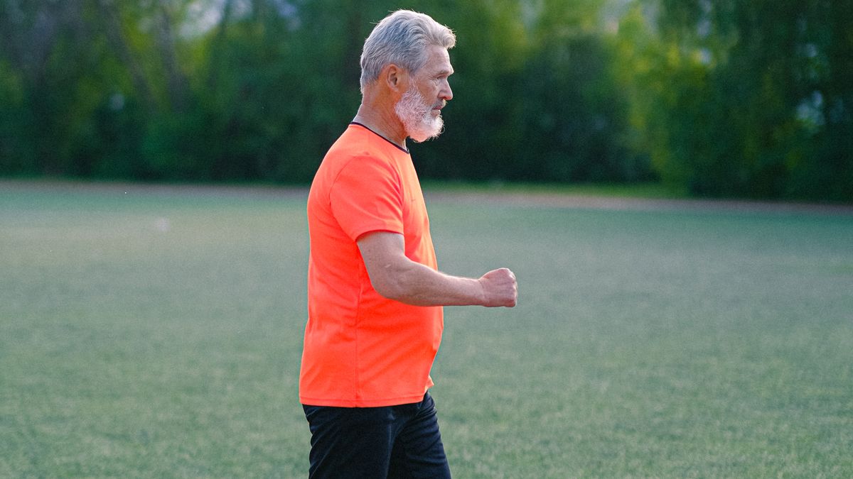 Older man staying active to prevent hernia complications