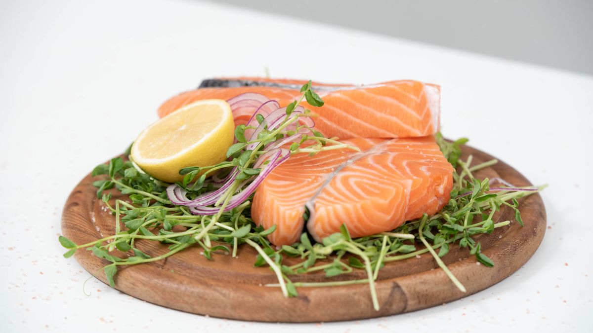 Plate of salmon with lemon, one of the best natural food sources of vitamin D